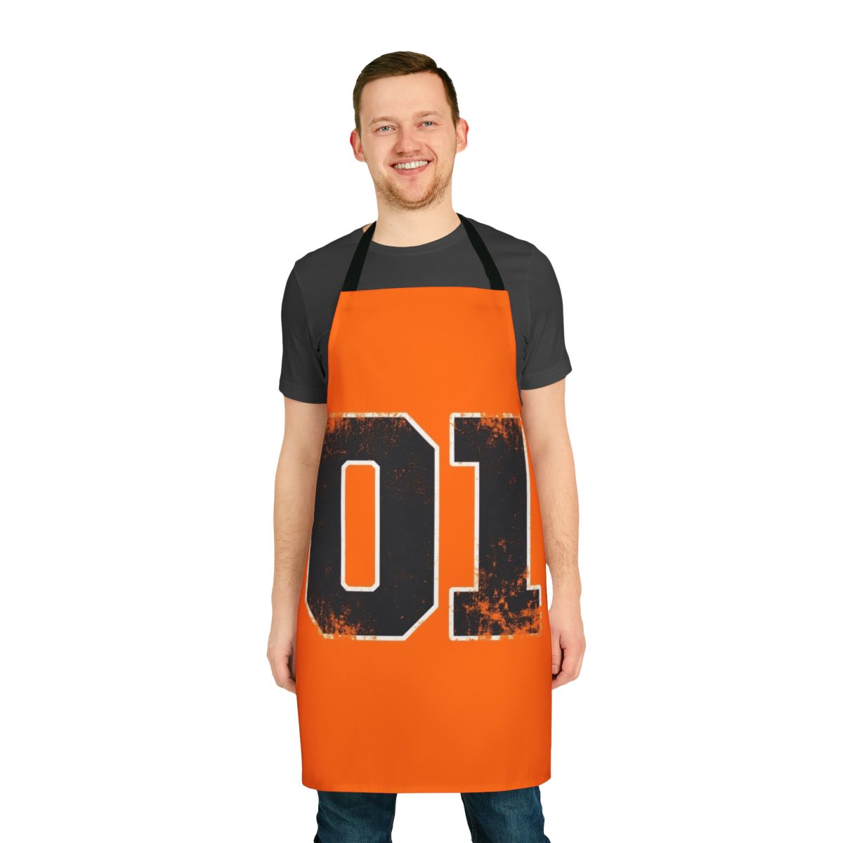 An orange apron featuring the iconic General Lee car from the Dukes of Hazzard TV show