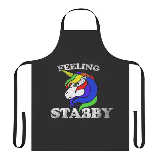 Retro-style unicorn apron with a "Feeling Stabby" design in rainbow colors