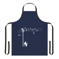 A white apron with a retro, funky design featuring musical elements like wires, sheet music, and a treble clef.
