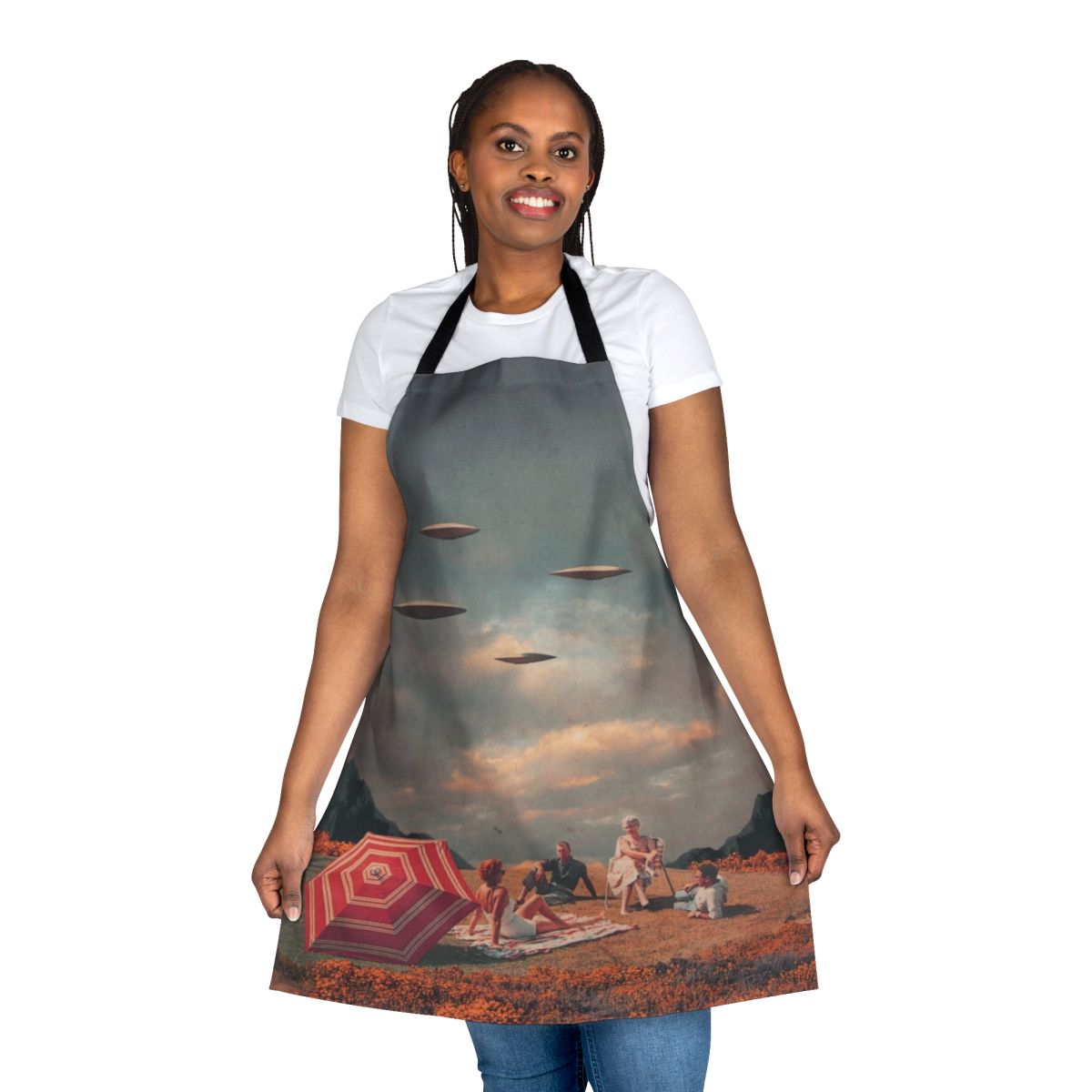 Vintage-inspired apron featuring a surreal digital collage of a retro-futuristic landscape with a floating spaceship, mountains, and a vibrant sky.
