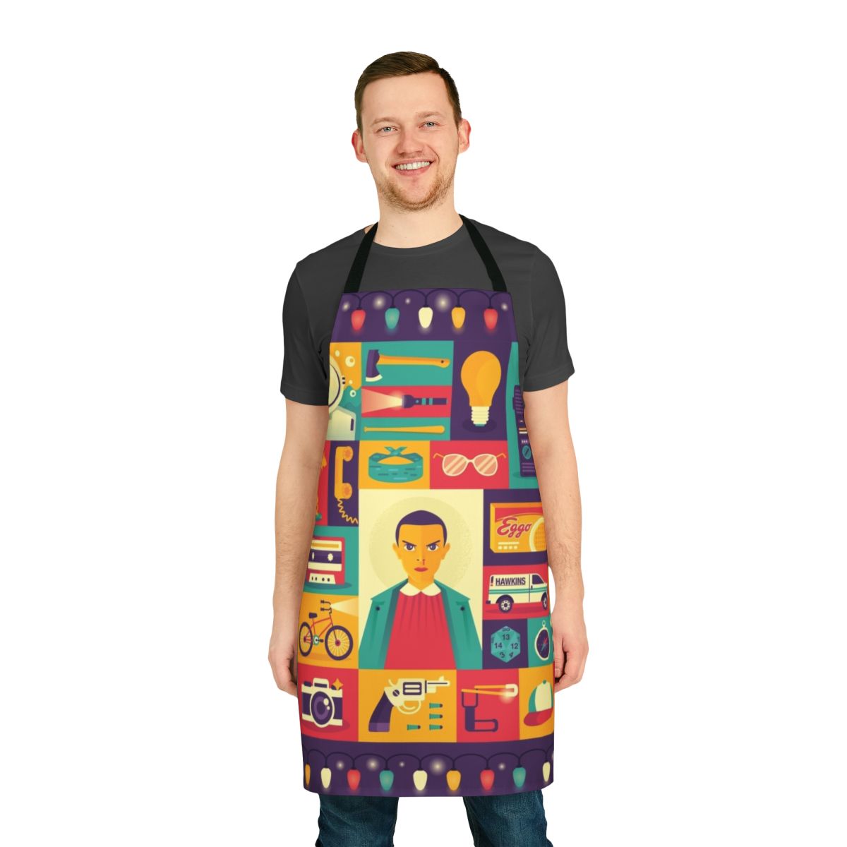Retro-style apron featuring Stranger Things Eleven icons