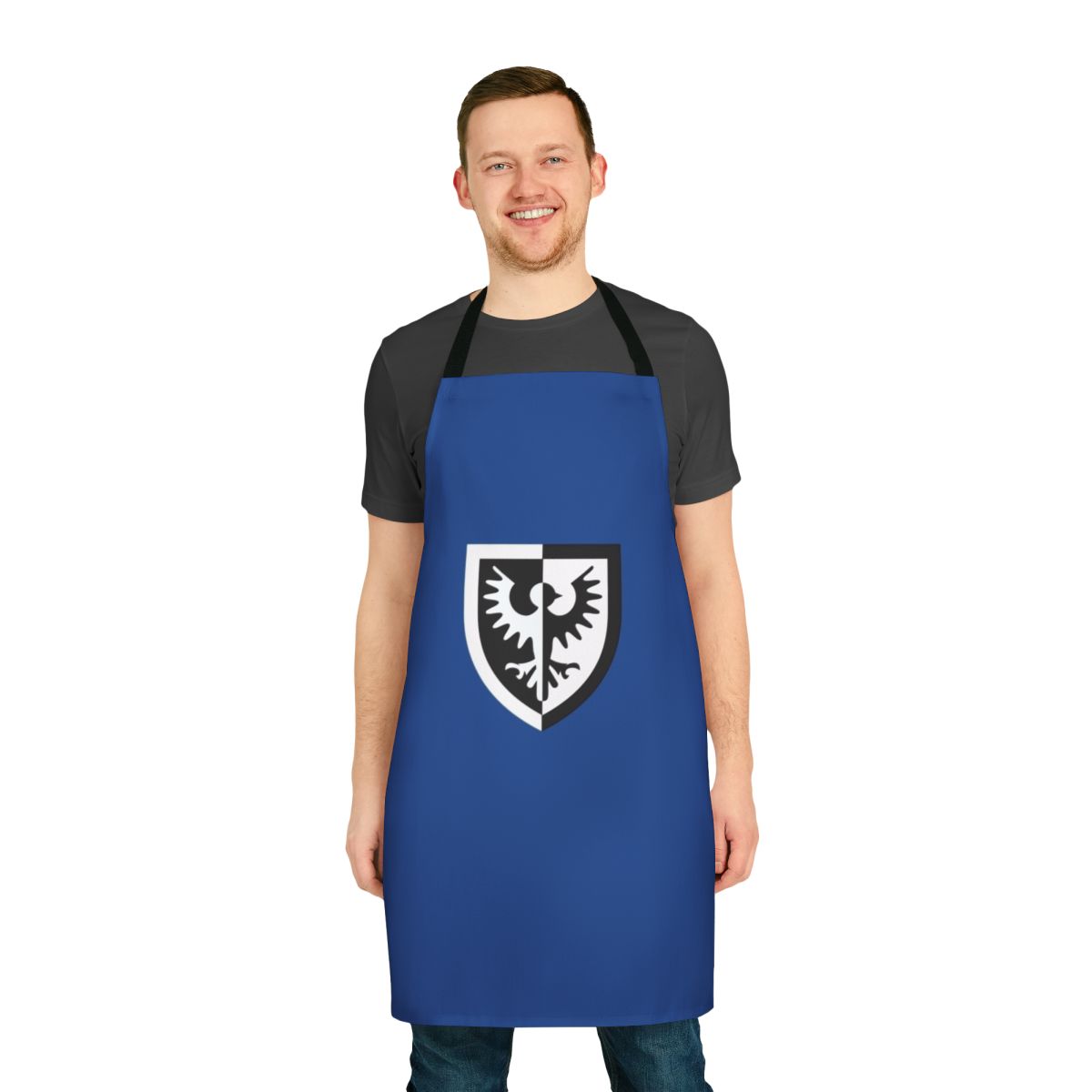 A black and yellow apron with a graphic inspired by the classic Lego Black Falcon minifigure.