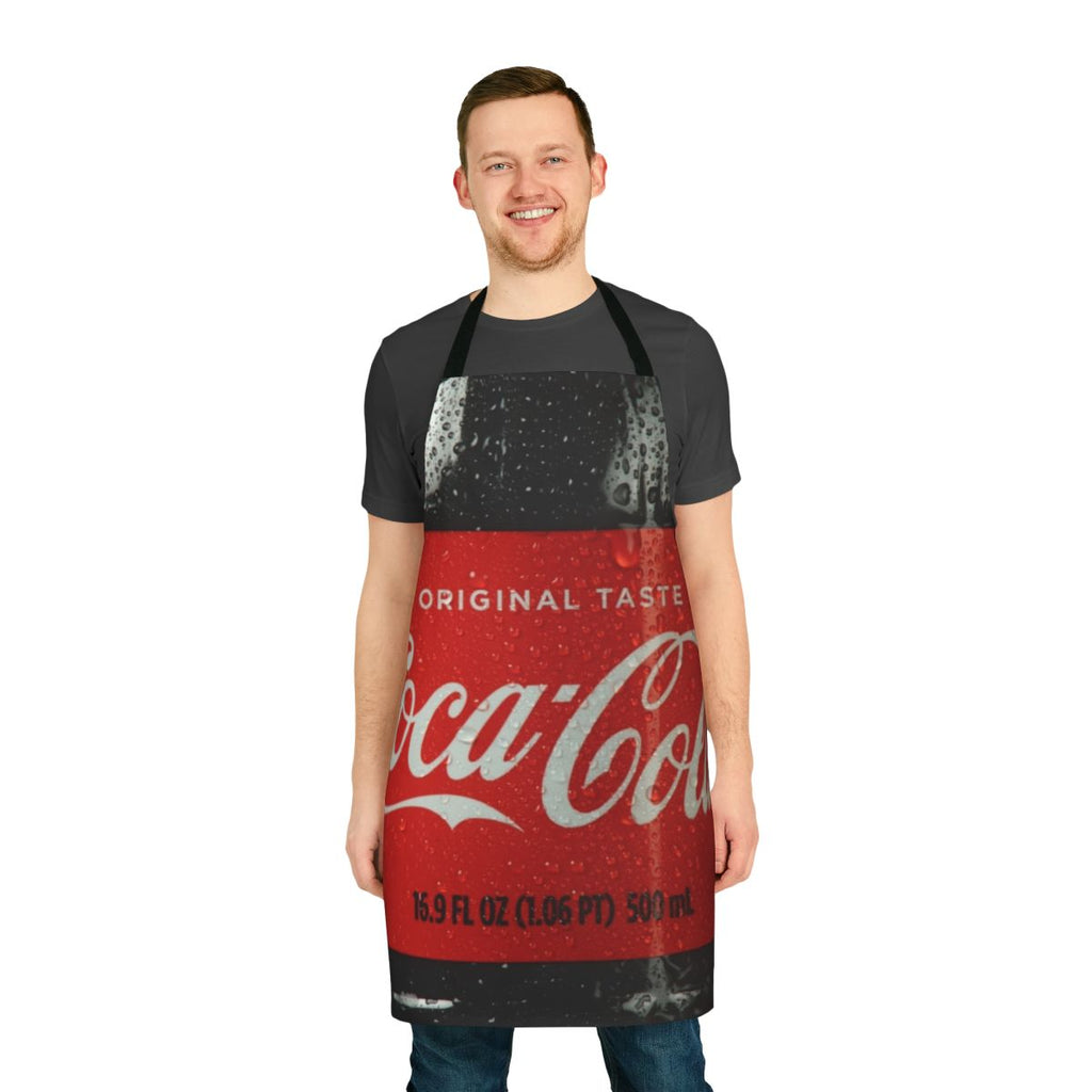 A vibrant red and white apron featuring a classic cola bottle design, perfect for the kitchen.