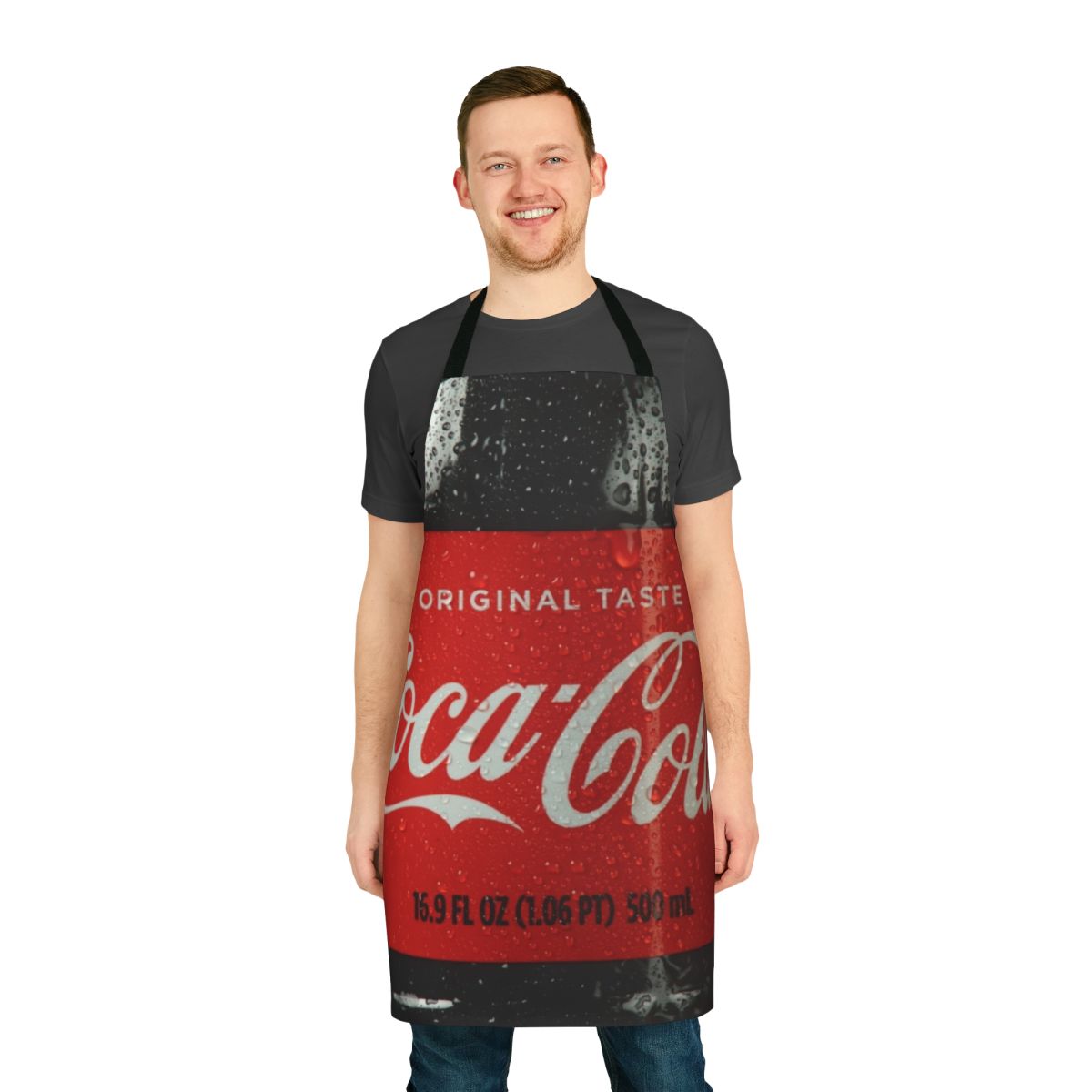A vibrant red and white apron featuring a classic cola bottle design, perfect for the kitchen.