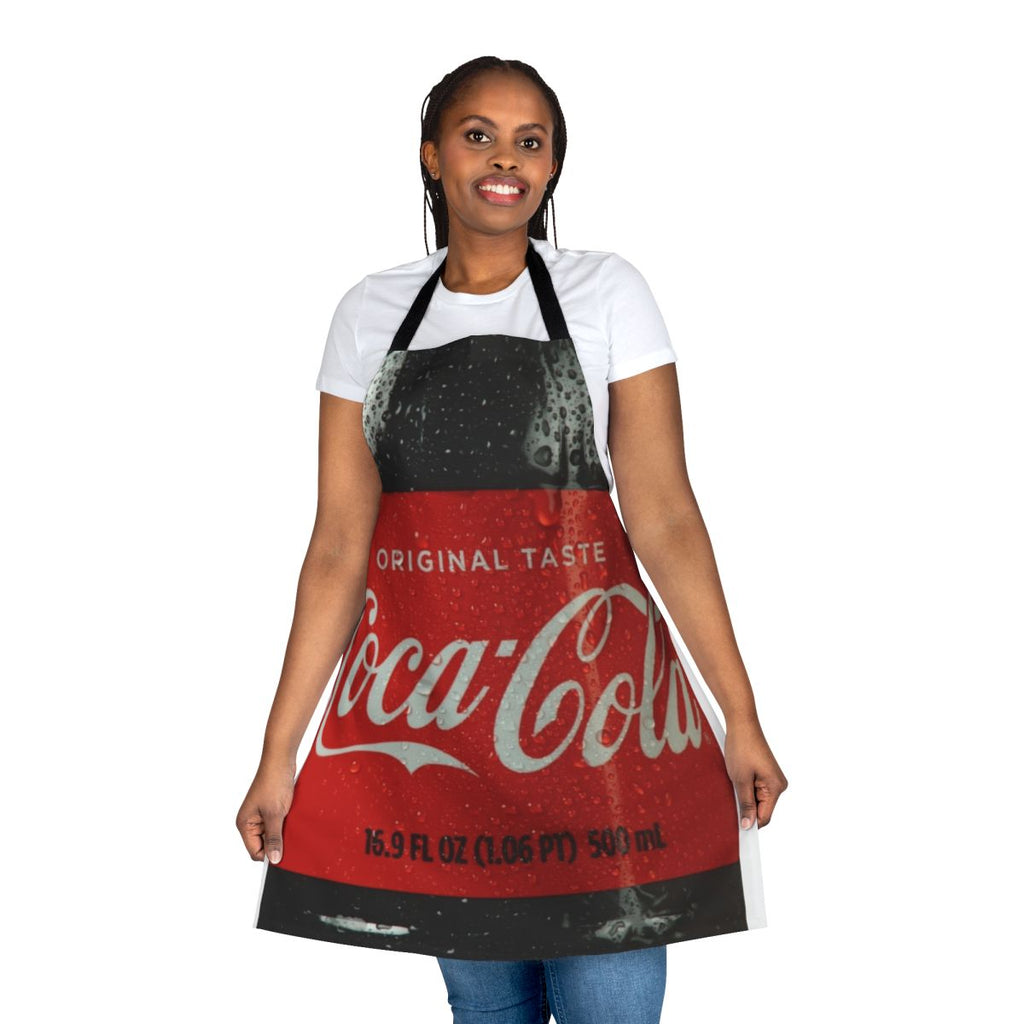 A vibrant red and white apron featuring a classic cola bottle design, perfect for the kitchen.