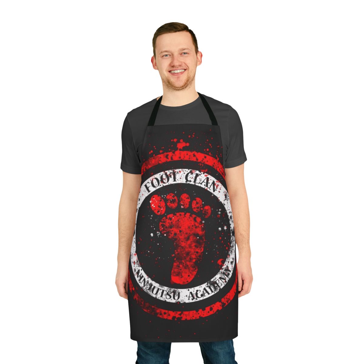 Vibrant retro-style apron featuring the iconic Foot Clan logo and ninja turtle silhouettes