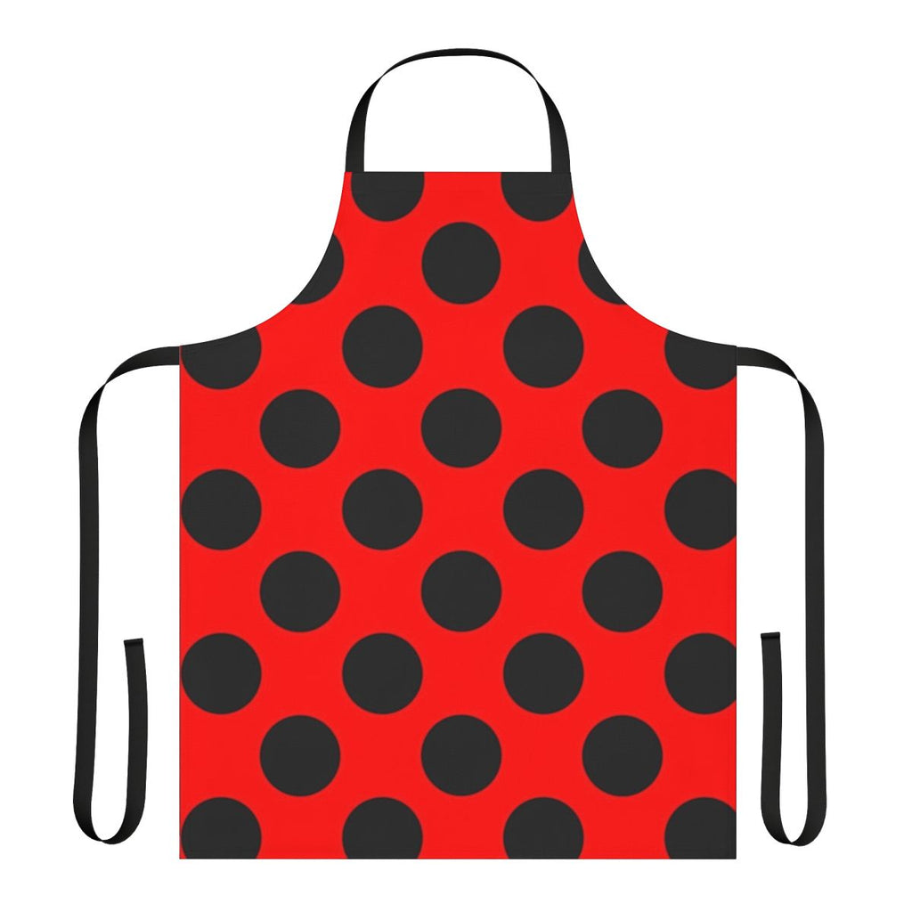 A red and black polka dot apron featuring a classic ladybug design