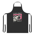 Retro-style apron with "Live Fast Eat Trash" design, featuring a raccoon graphic and 80s inspired elements
