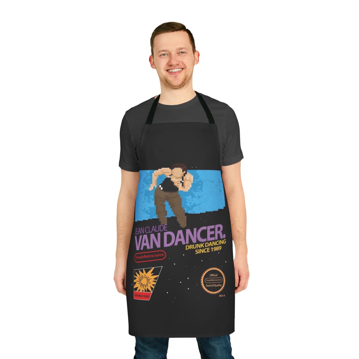 Retro-styled apron featuring a parody of Jean Claude Van Damme's martial arts and dancing skills.