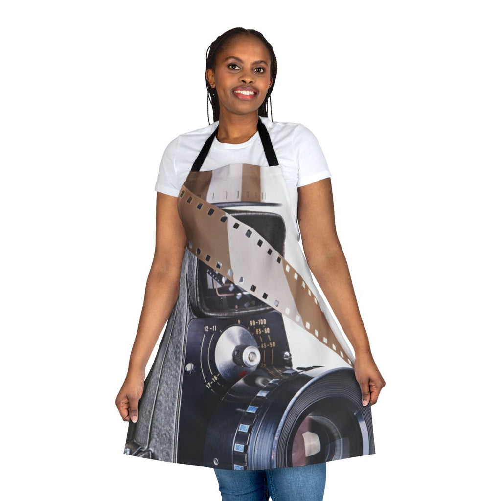 Retro mechanical movie camera and film apron, featuring vintage and obsolete camera and film reel symbols