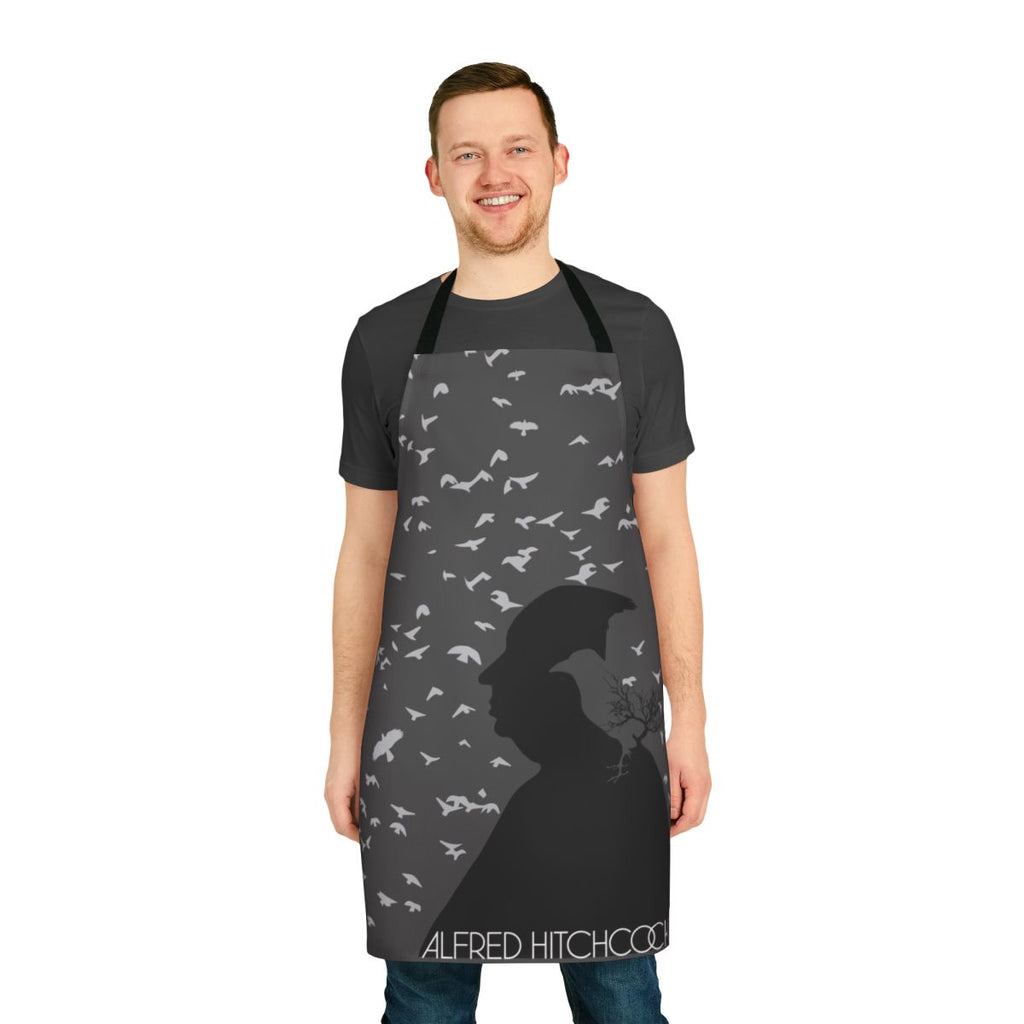 Vintage-style apron featuring a black and white graphic of Alfred Hitchcock and birds, inspired by the classic film "The Birds"