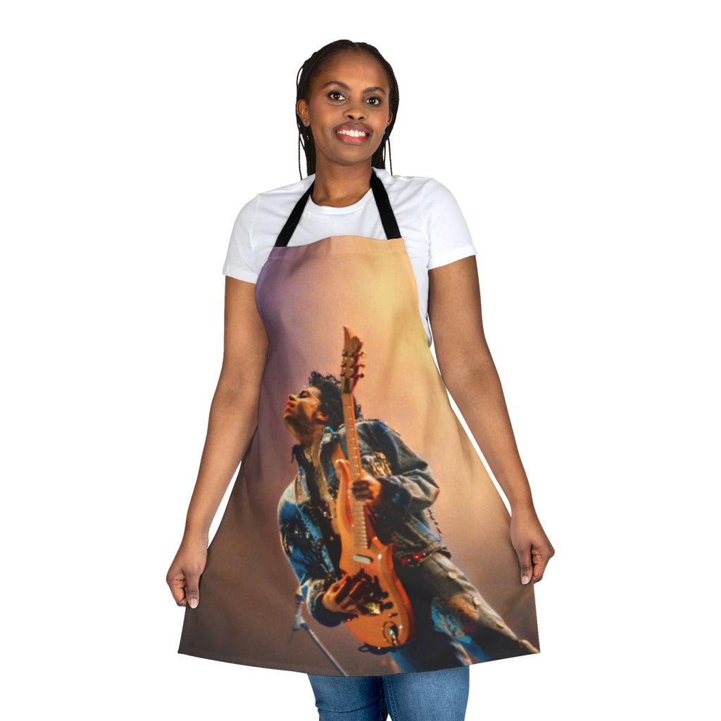 Retro-style apron featuring a musical theme and Prince-inspired design