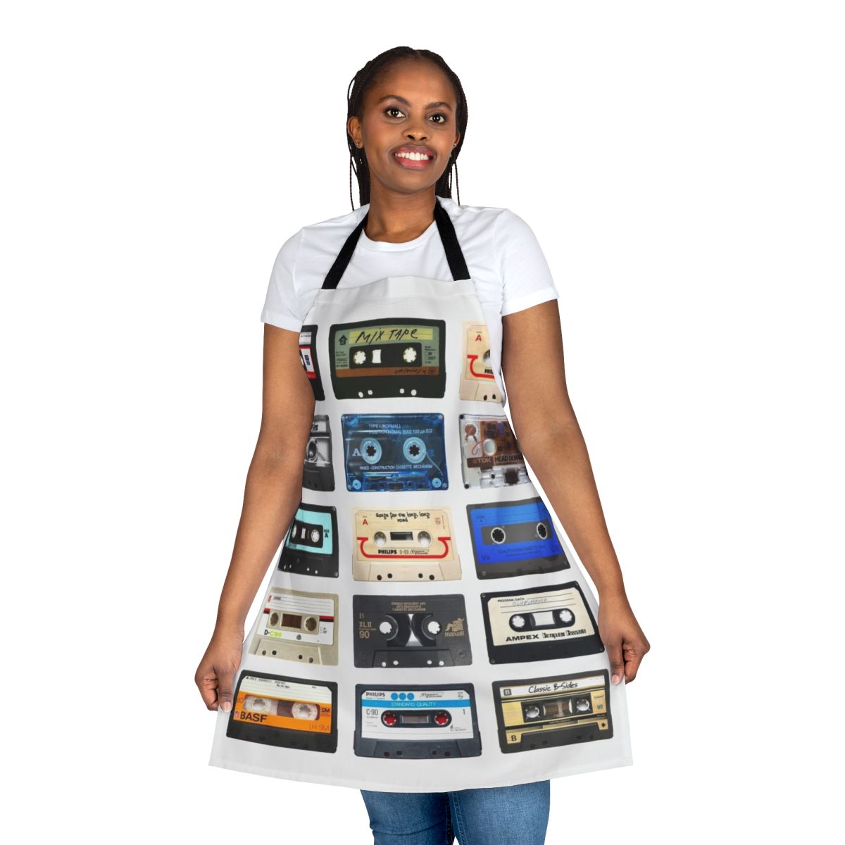 Retro music-themed apron with vintage boombox, cassette tape, and headphone graphics