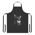 Black and white portrait of Kim Deal of The Breeders playing guitar, printed on a high-quality apron.
