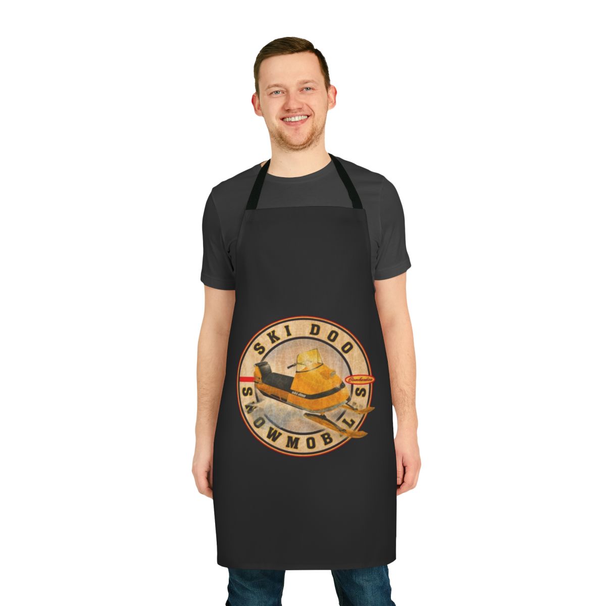 Vintage Ski Doo snowmobile graphics on a classic black apron