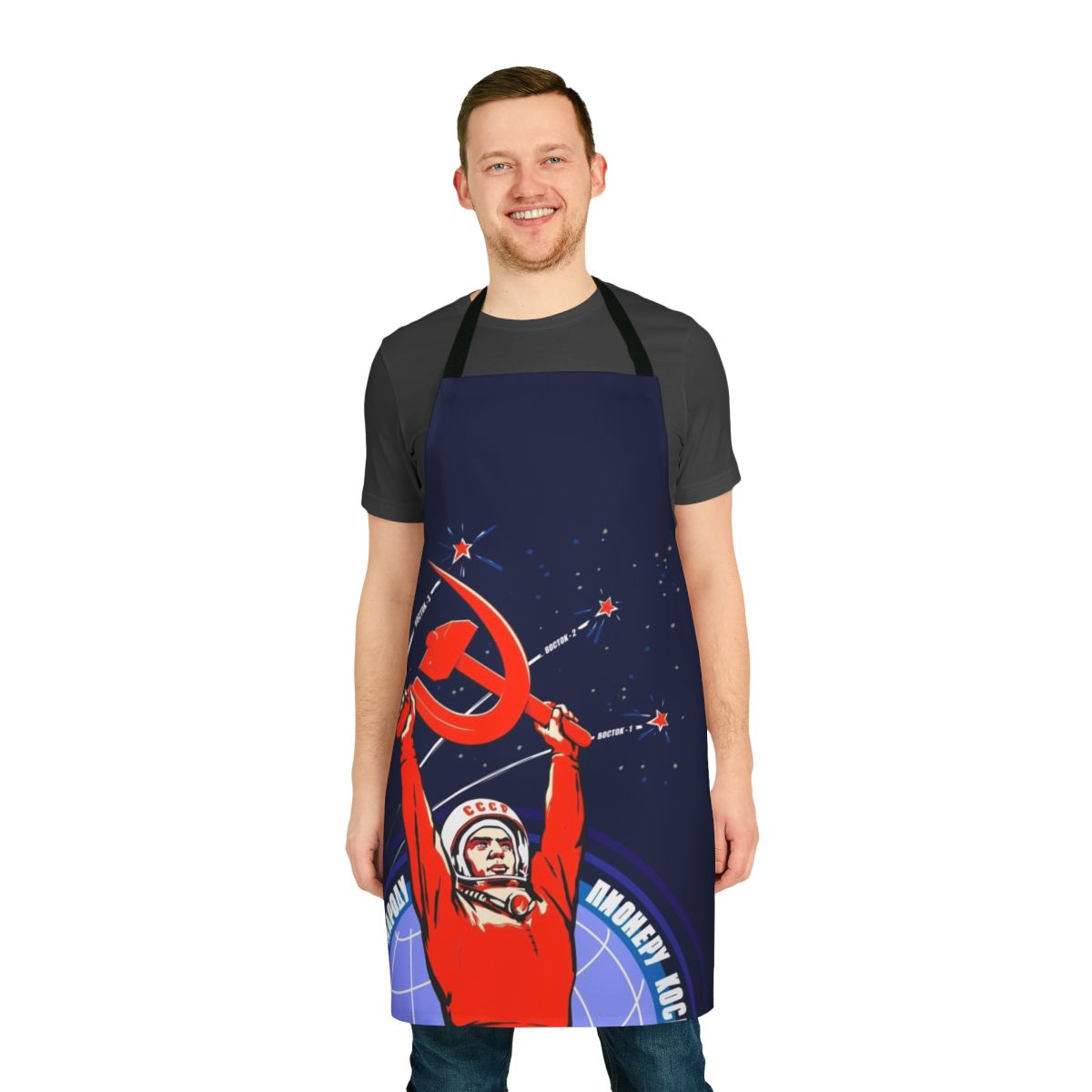 Vintage-style apron featuring a Soviet-era propaganda image of Yuri Gagarin, the first human in space.