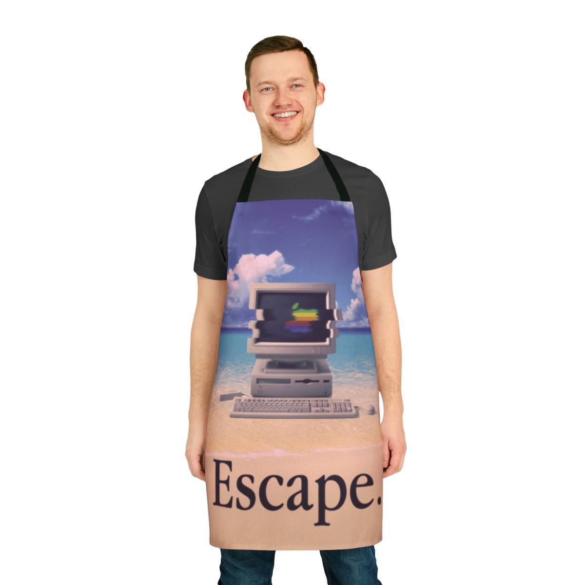 A beige and rainbow colored apron with a retro Macintosh computer design, representing the vaporwave aesthetic.