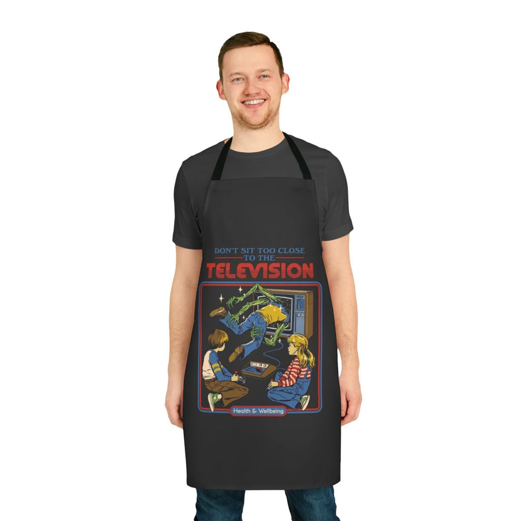 Retro video game horror-themed apron with a "Don't Sit Too Close" design