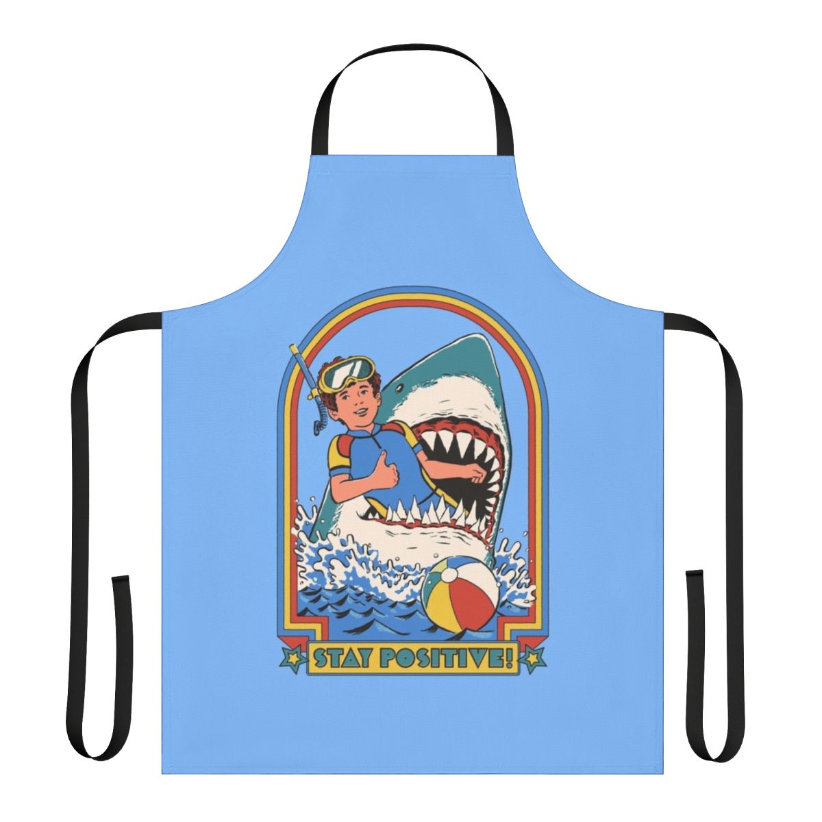A white apron with a vintage-style illustration of a shark swimming in the ocean, with the text "Stay Positive" printed on it.