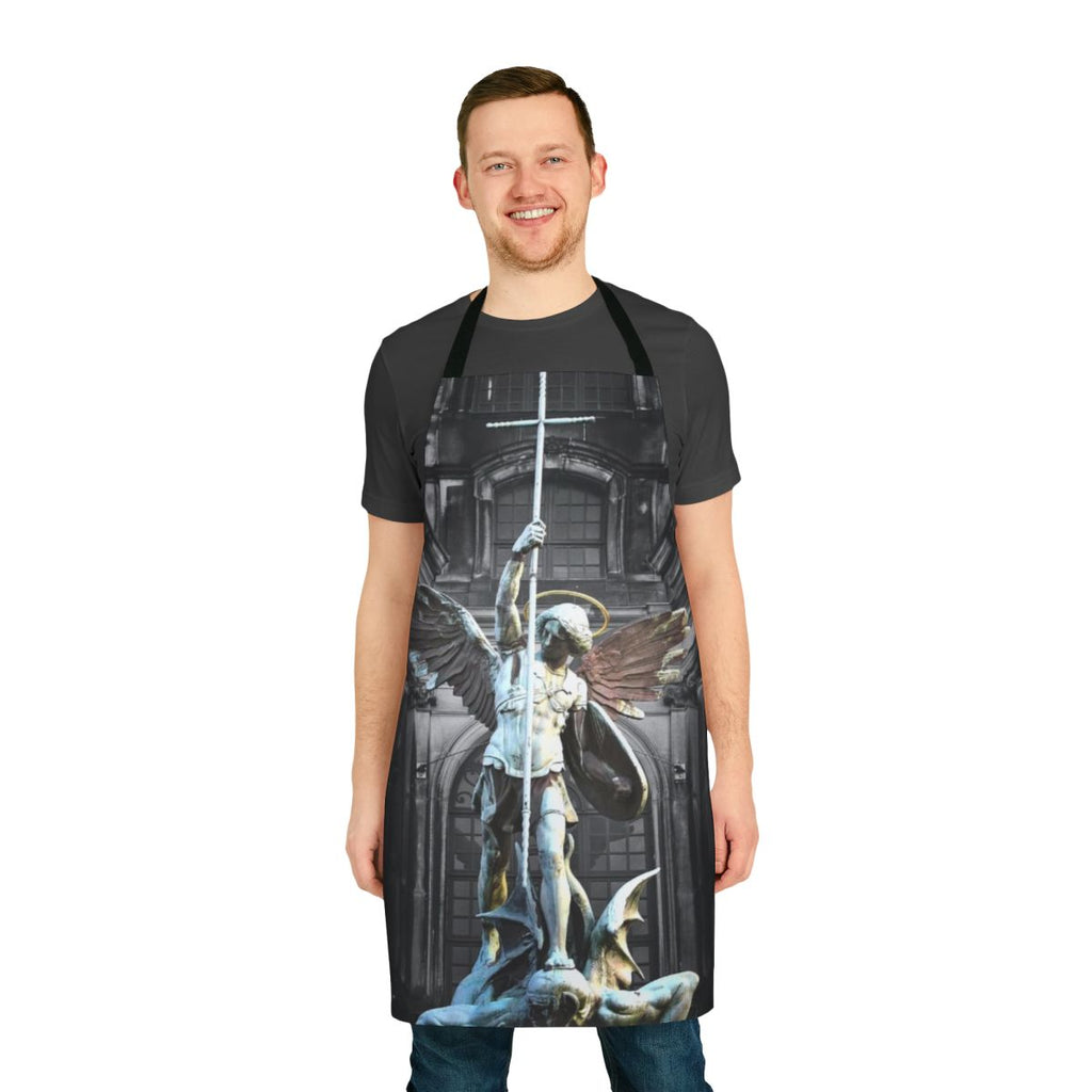 Closeup of an apron featuring a detailed illustration of St. Michael the Archangel, a highly revered Catholic saint.