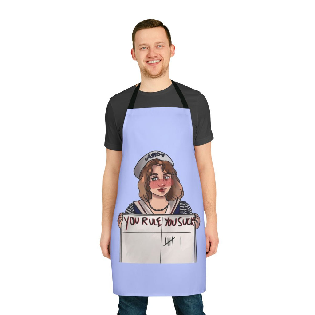 A black apron with the text "Robin Stranger Things You Rule You Suck" printed on it, representing a popular character from the Netflix series Stranger Things.