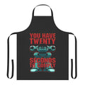 A black apron featuring the iconic ED-209 robot from the Robocop movie.
