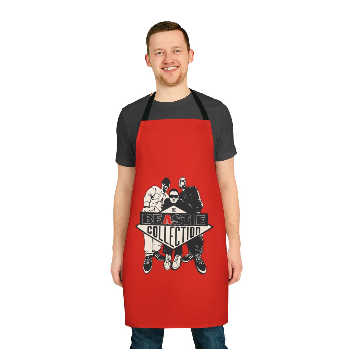 Red punk rock-inspired apron with skull and crossbone design for boys and music fans