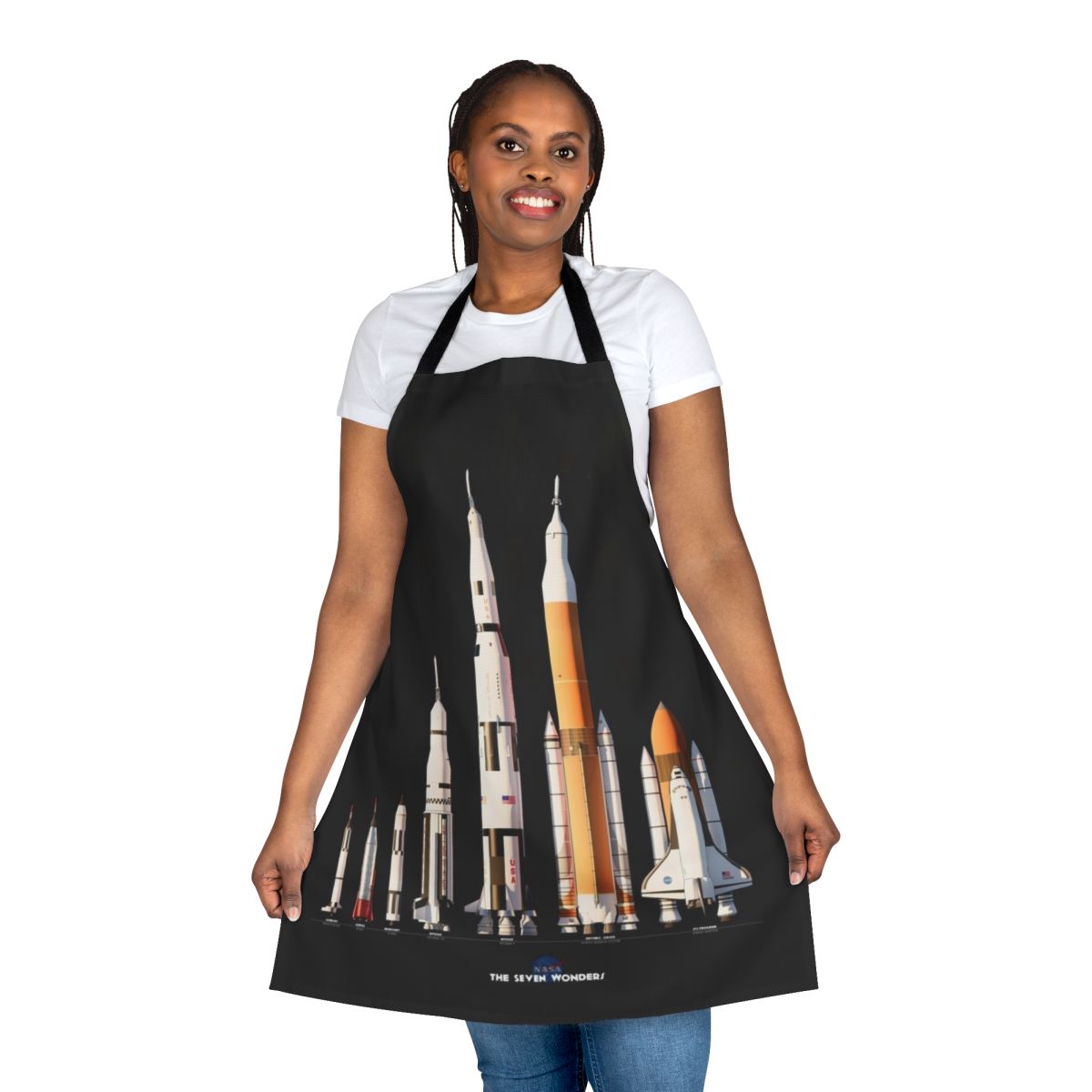 Apron with a black background featuring various NASA rockets and spaceships