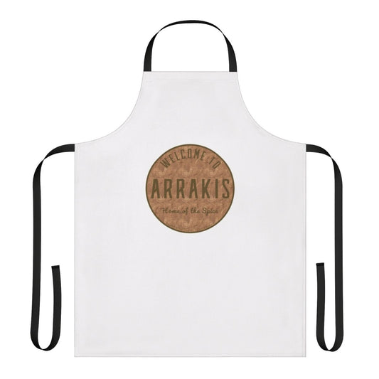 A round dark pattern apron inspired by the sci-fi classic Dune, featuring the planet Arrakis and the House Atreides logo.