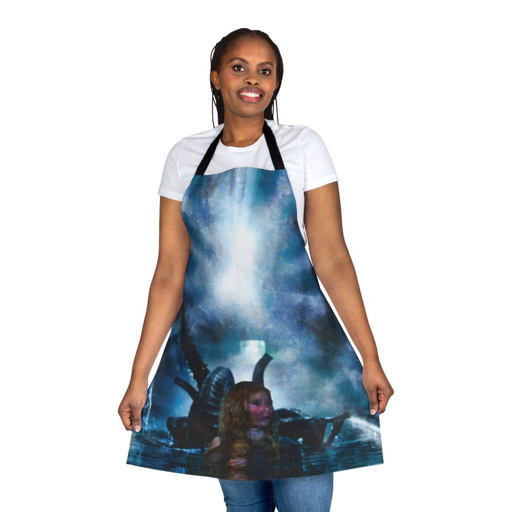 Person wearing an apron featuring a Newt character from the sci-fi movie Aliens