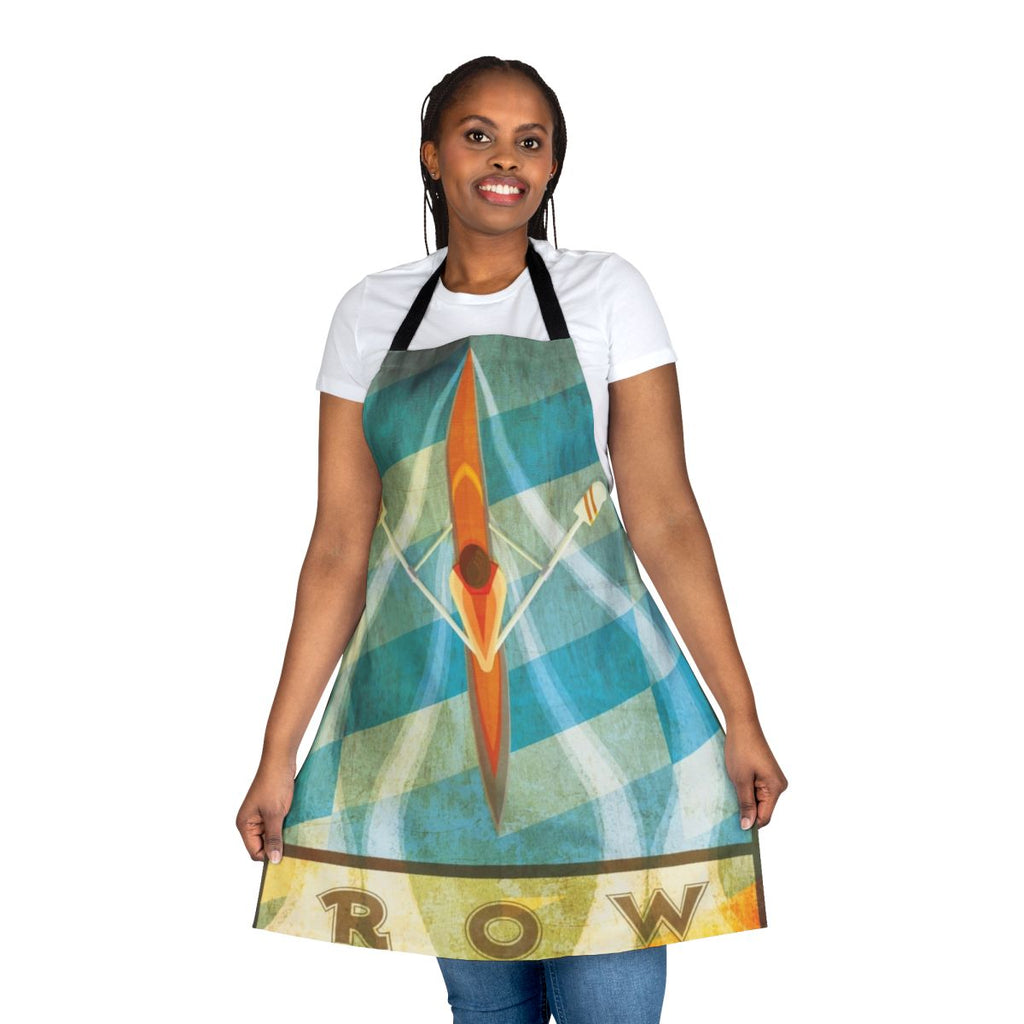 Person wearing a sculling apron with oars in the background
