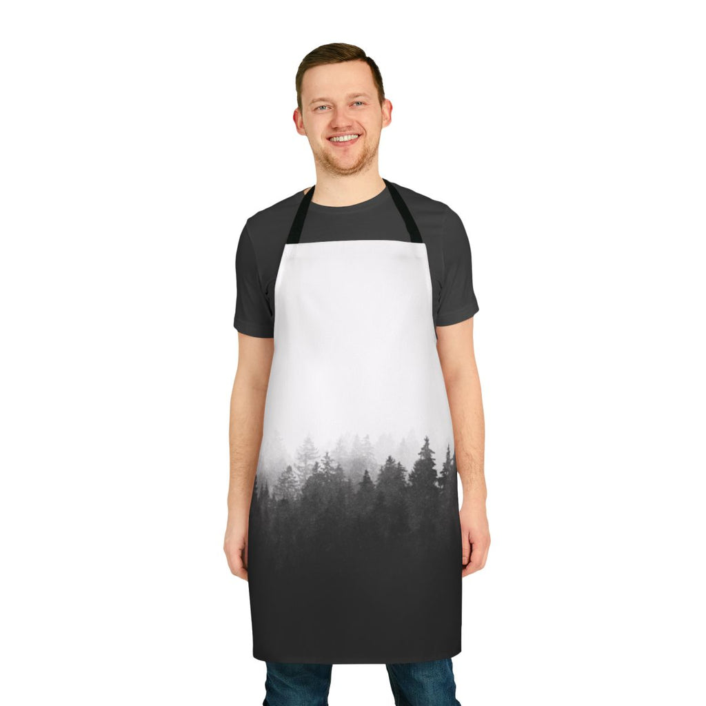 A serene and atmospheric apron featuring a landscape of trees and fog, perfect for nature lovers and outdoor enthusiasts.