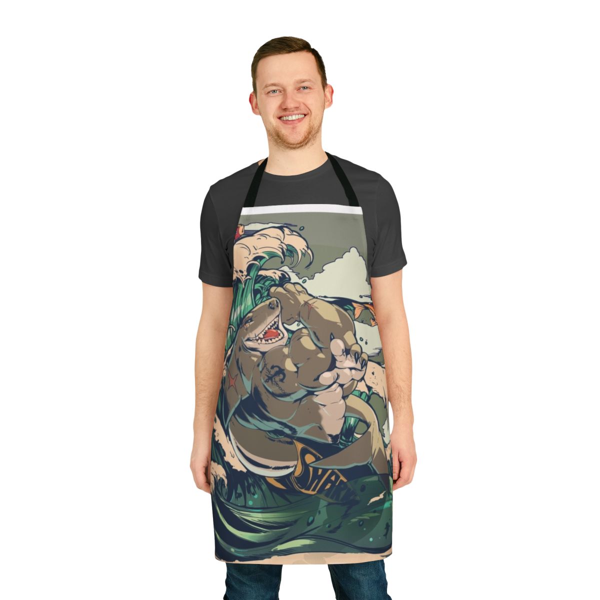 Photo of an apron featuring a muscular shark-like creature standing in a pond
