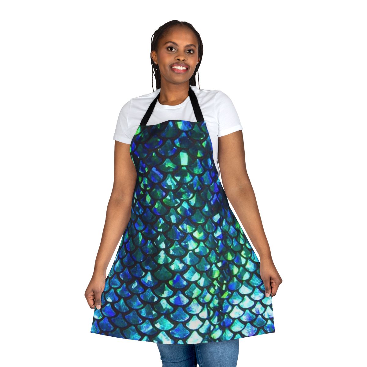 Woman wearing a turquoise and shimmery apron with a mermaid fish scale design