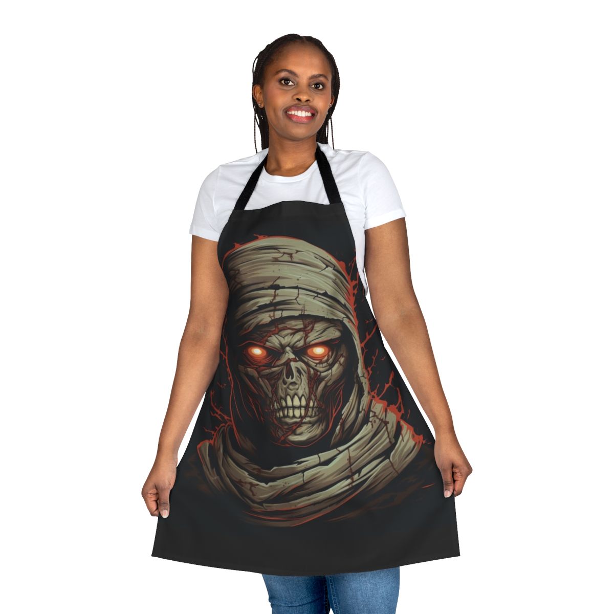 A dark, sinister-looking apron with a mummy design, featuring cracked pale skin, glowing red eyes, and sharp decayed teeth.