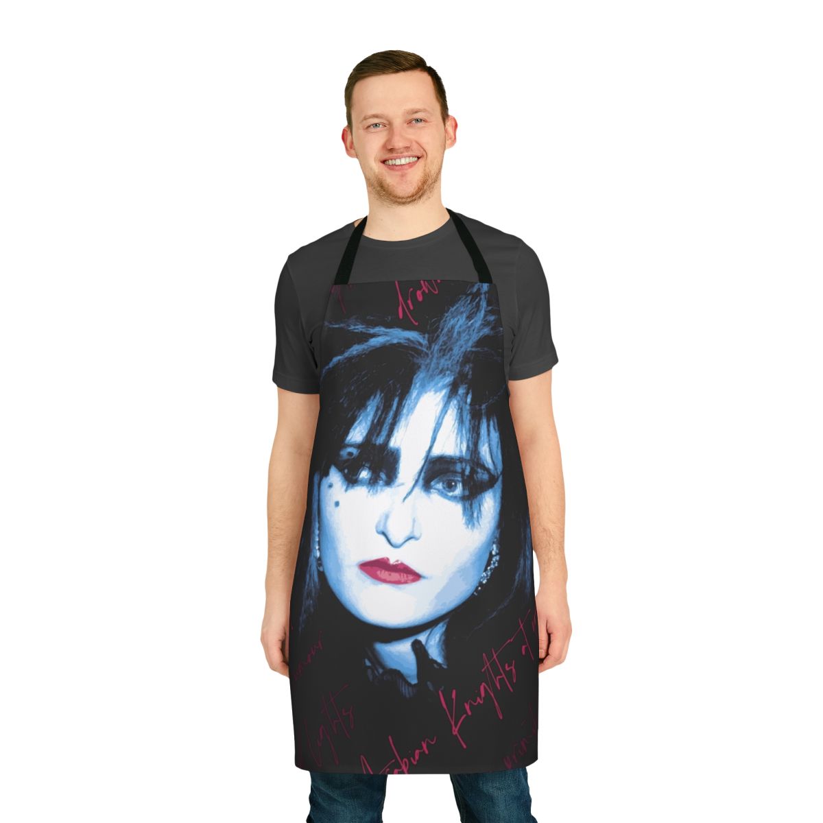 A black and white apron featuring a bold gothic design inspired by Siouxsie Sioux and the 1980s post-punk and new wave era.