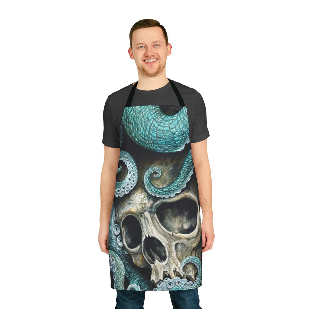 Skull and octopus artwork printed on a black apron with tentacle designs, ideal for cooking and kitchen use.