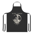 A black apron with the phrase "Its The Moon" printed on it, inspired by the progressive metal band Sleep Token.