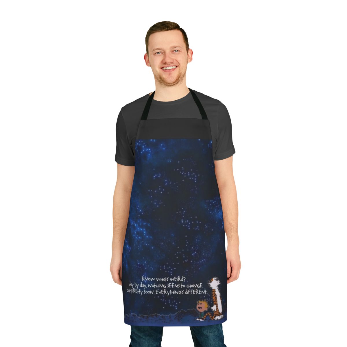 A space-themed apron featuring the beloved Calvin and Hobbes characters.