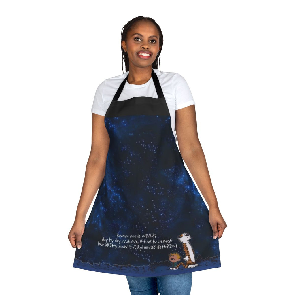 A space-themed apron featuring the beloved Calvin and Hobbes characters.