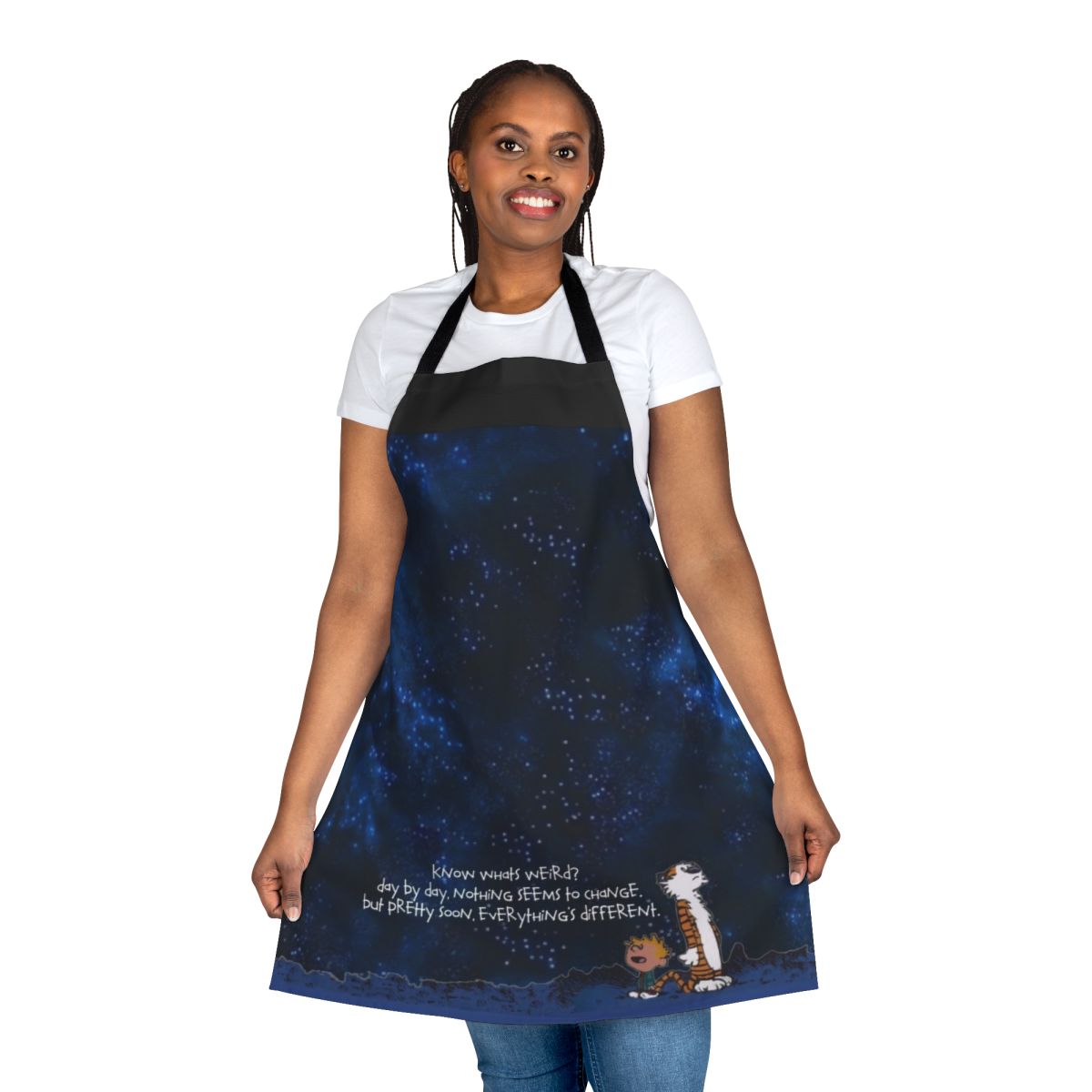 A space-themed apron featuring the beloved Calvin and Hobbes characters.