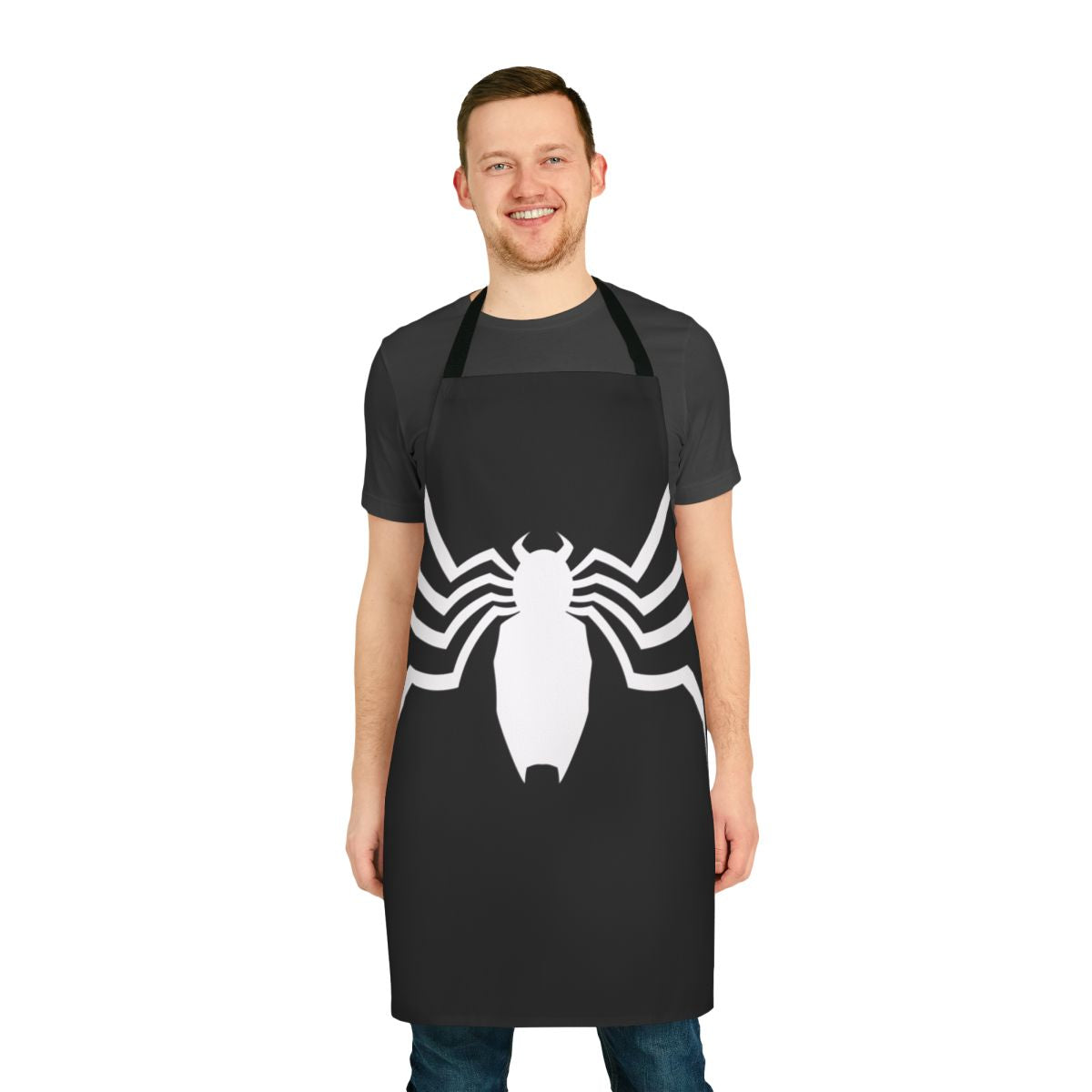 A stylish black and white apron with a spider web design, perfect for the spider-loving home cook or comic book fan.