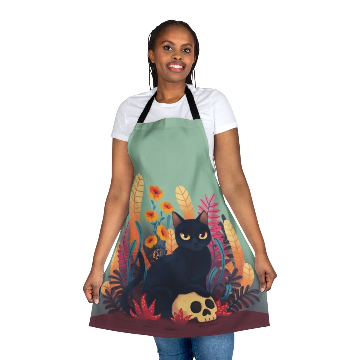 An apron featuring a cute and spooky skull cat design with floral and autumn elements.