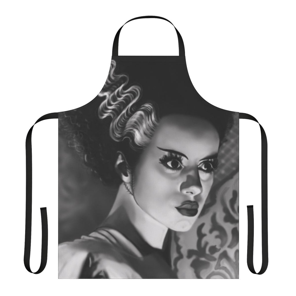 A white apron featuring a bride-inspired design with gothic and horror-themed elements, perfect for fans of classic monster movies.