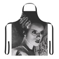 A white apron featuring a bride-inspired design with gothic and horror-themed elements, perfect for fans of classic monster movies.