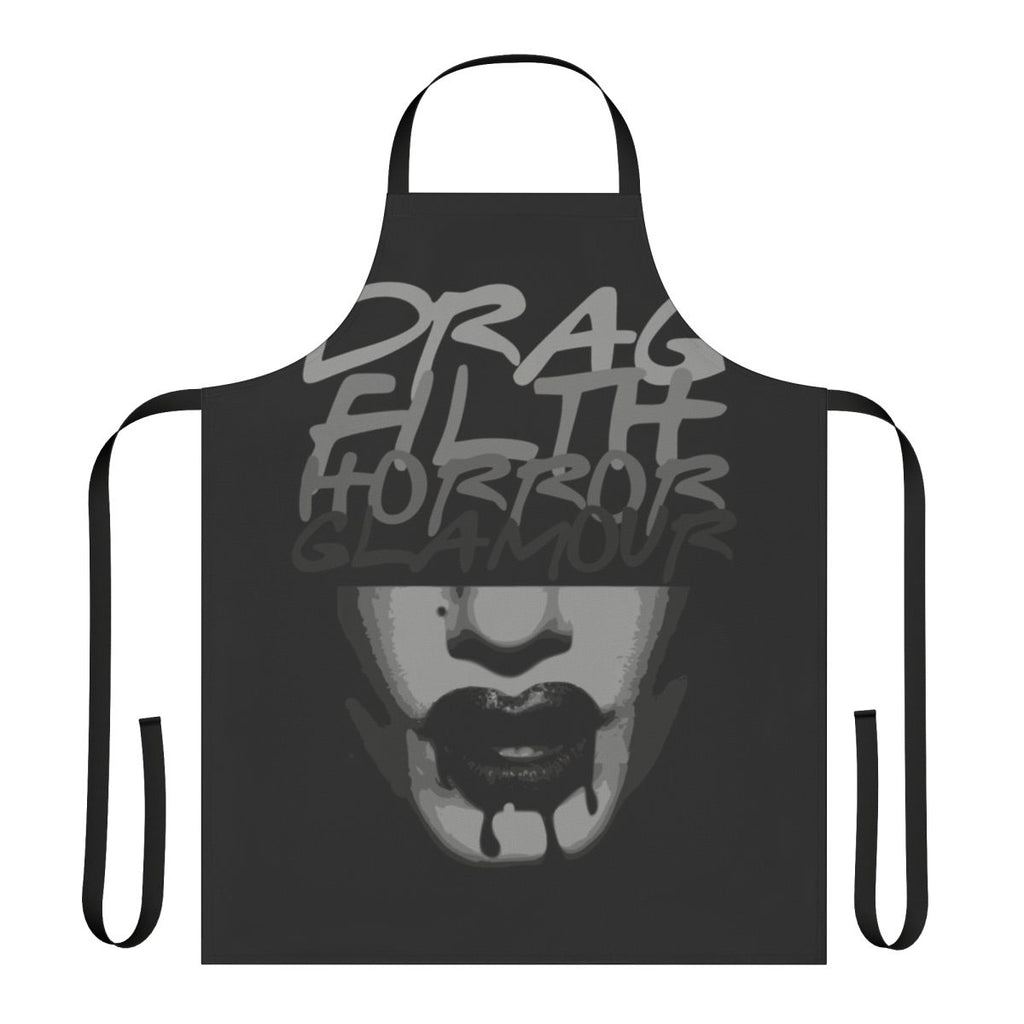 A spooky and glamorous apron featuring horror-inspired designs, perfect for drag enthusiasts and Halloween celebrations.