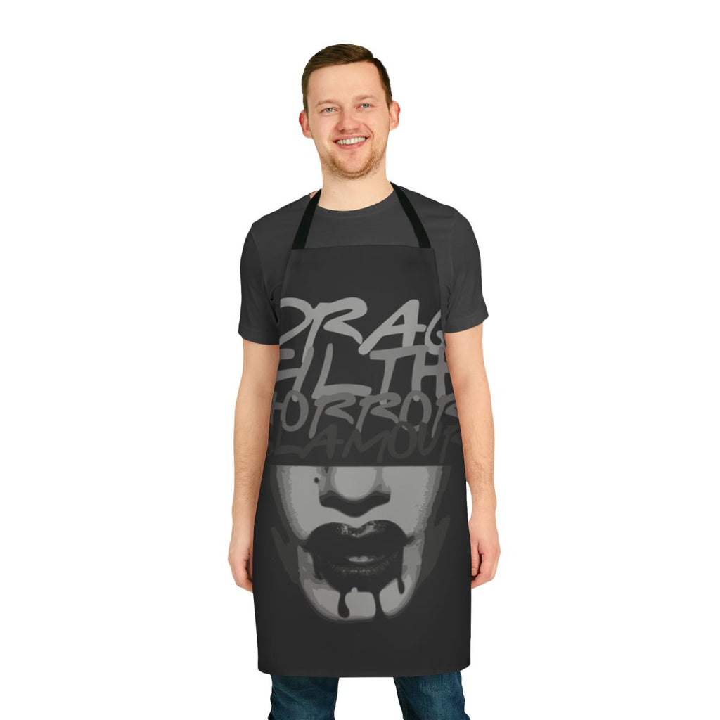 A spooky and glamorous apron featuring horror-inspired designs, perfect for drag enthusiasts and Halloween celebrations.
