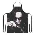 A black and white apron featuring the iconic image of Eric Draven from the cult classic film "The Crow".