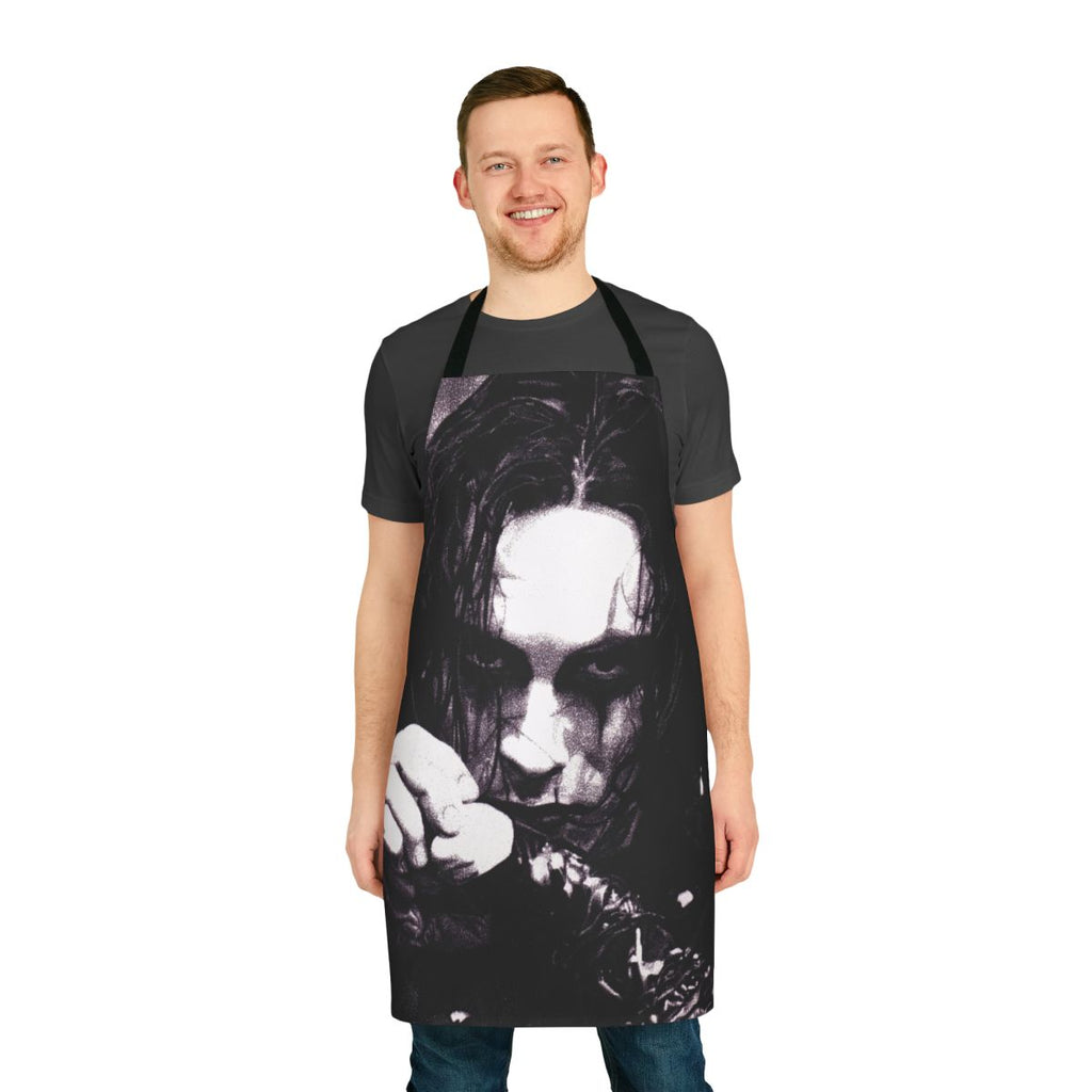A black and white apron featuring the iconic image of Eric Draven from the cult classic film "The Crow".