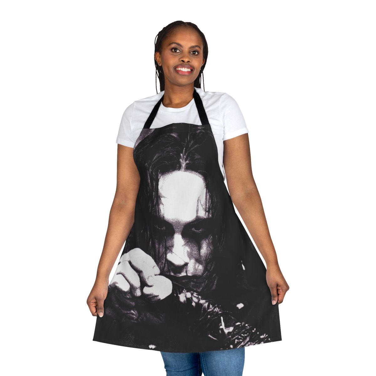 A black and white apron featuring the iconic image of Eric Draven from the cult classic film "The Crow".